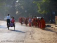 Monk's morning walk / morning ritual - collecting food in Yangon